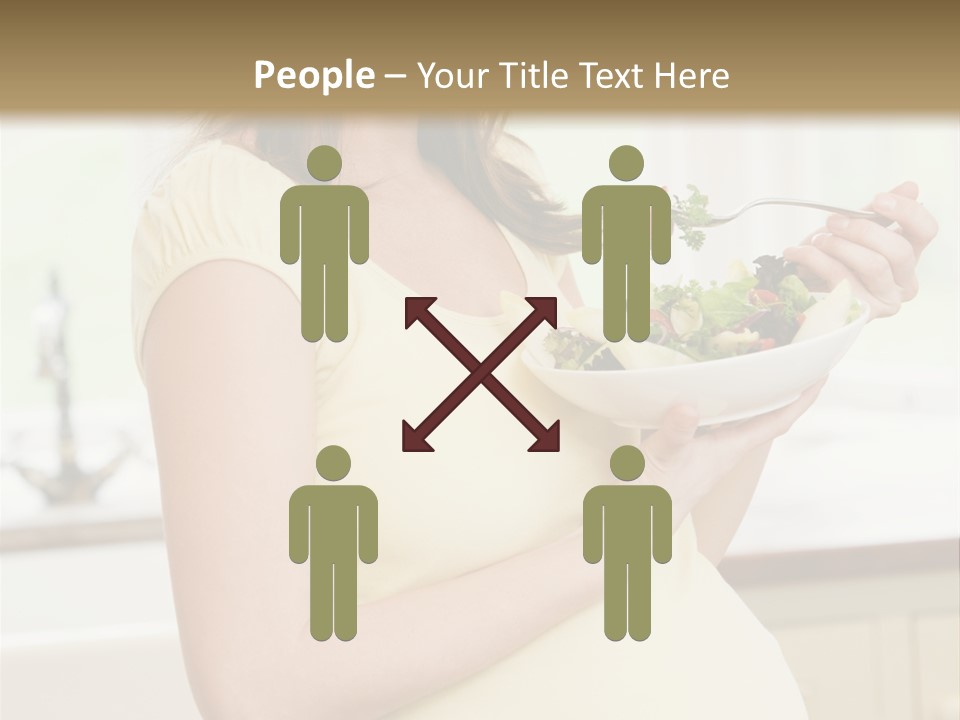 Pregnant Woman In Kitchen Eating A Salad Smiling PowerPoint Template