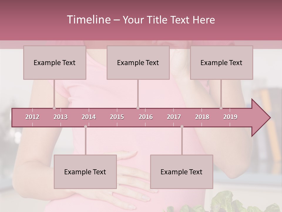 Pregnant Woman In Kitchen Making A Salad And Smiling PowerPoint Template