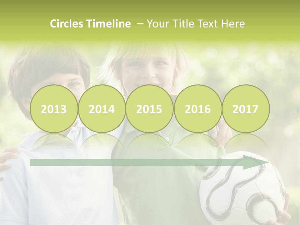 Two Young Boys Outdoors With Soccer Ball Smiling PowerPoint Template