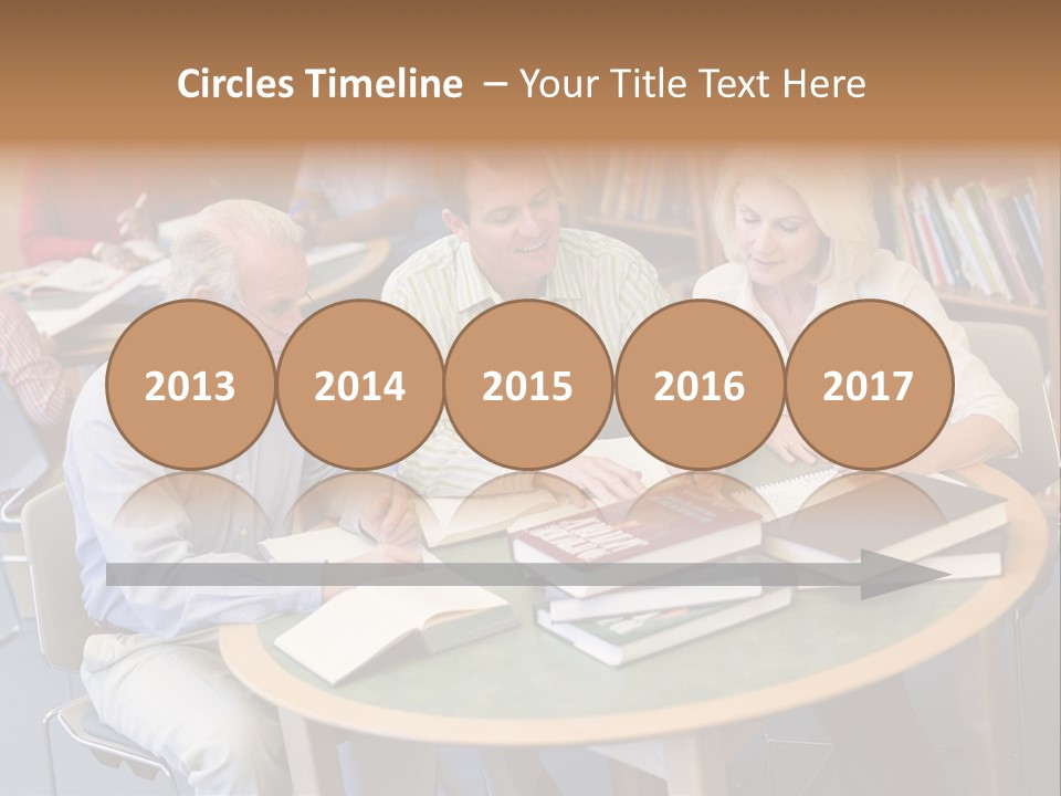 A Group Of People Sitting Around A Table With Books PowerPoint Template