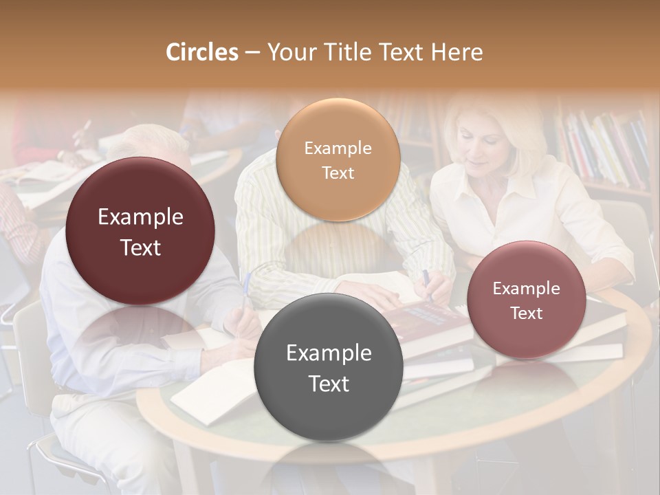 A Group Of People Sitting Around A Table With Books PowerPoint Template
