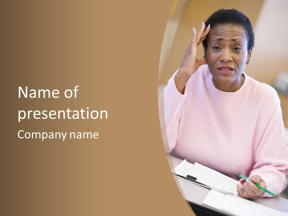 Mature Female Student Looking Confusion In Class PowerPoint Template