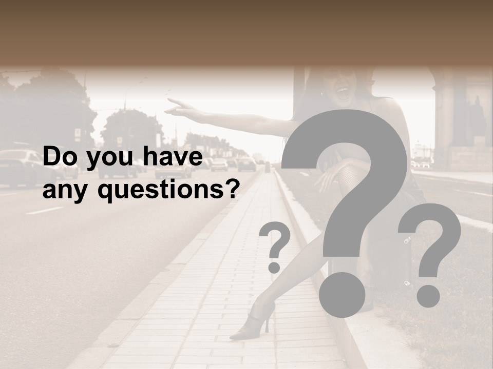 A Woman Is Sitting On A Post On The Side Of The Road PowerPoint Template