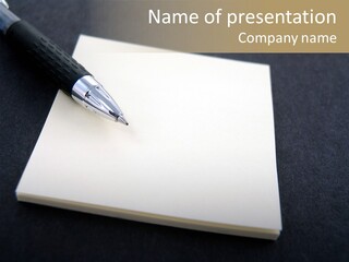 A Pen Resting On Top Of A Piece Of Paper PowerPoint Template