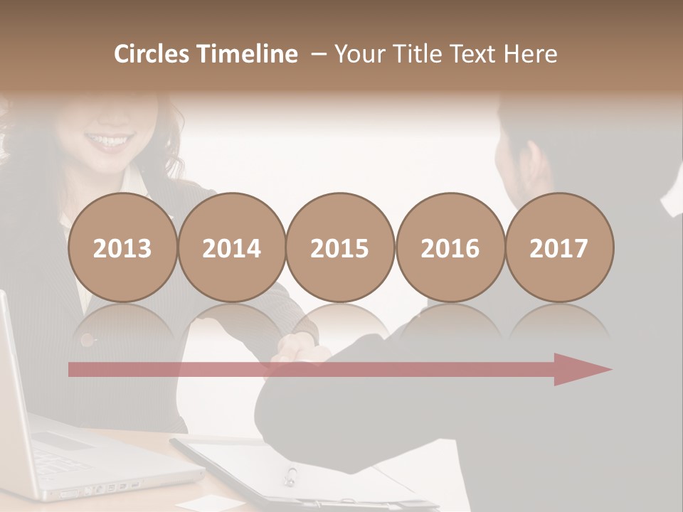 A Smiling Businesswoman Shakes Hands With A Young Businessman PowerPoint Template