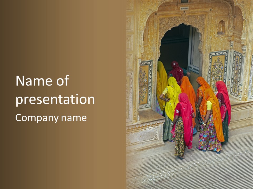 Indian Women In Bright Orange Saris In The Courtyard Of A Rajput Palace. Tiger Fort, Jaipur, Rajasthan, India PowerPoint Template