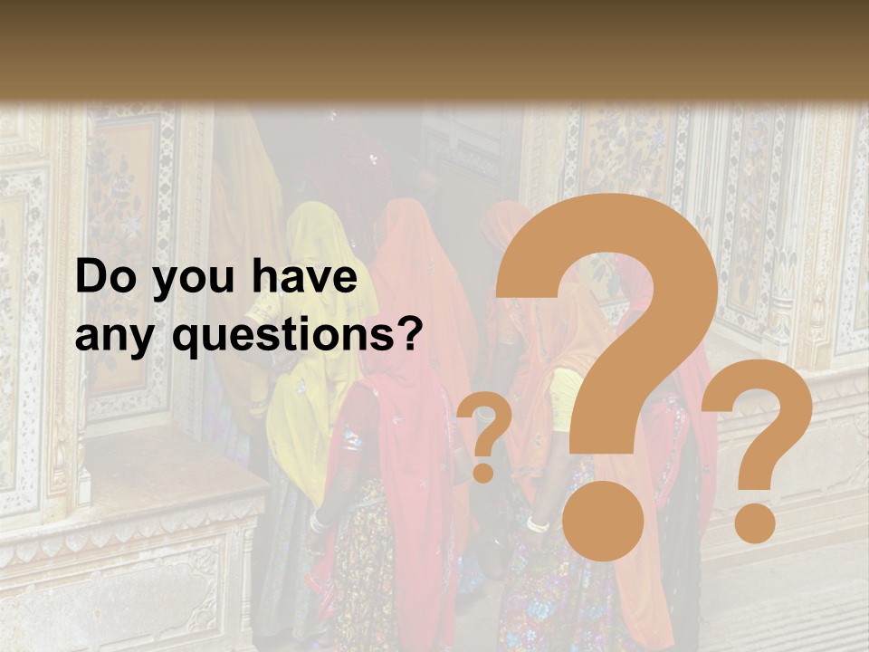 Indian Women In Bright Orange Saris In The Courtyard Of A Rajput Palace. Tiger Fort, Jaipur, Rajasthan, India PowerPoint Template