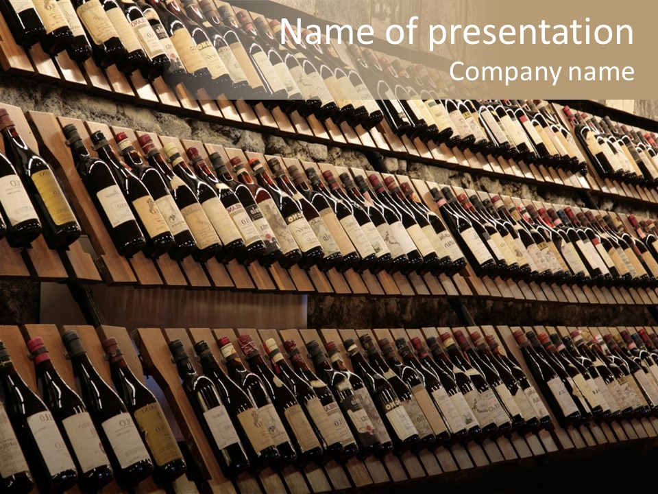 A Wall Full Of Bottles Of Wine In A Wine Cellar PowerPoint Template