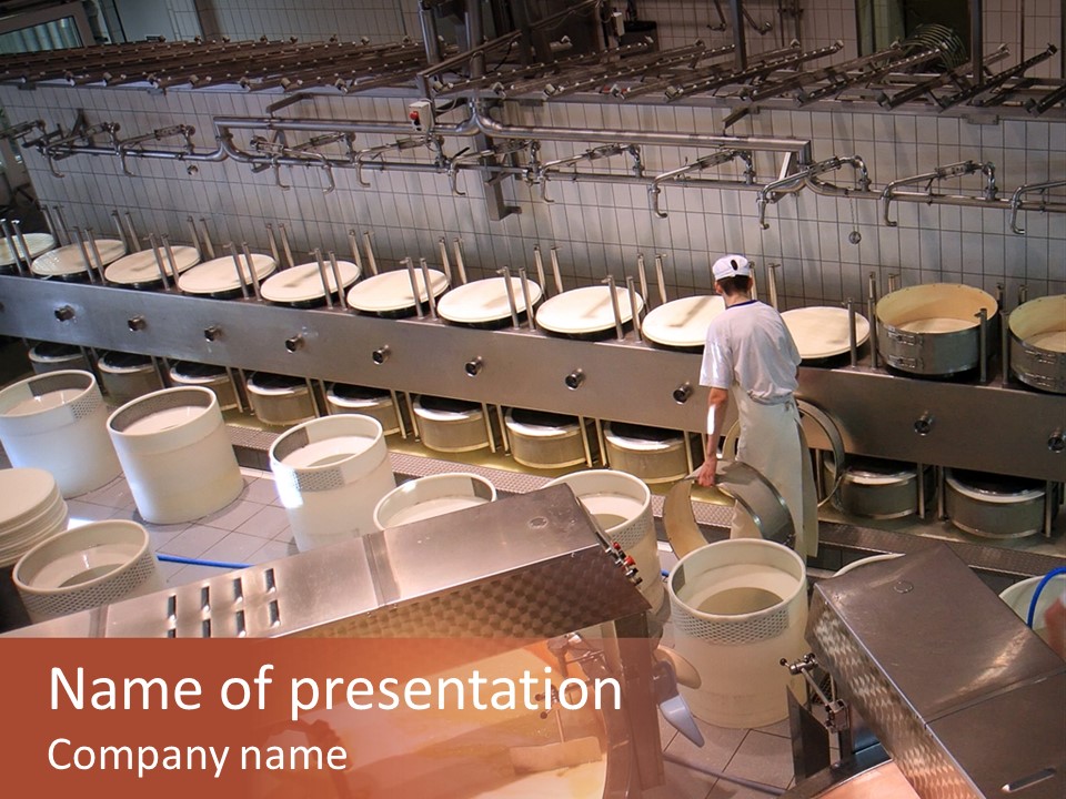 A Dairy Plant In Switzerland Processing Fresh Milk Into Cheese. PowerPoint Template