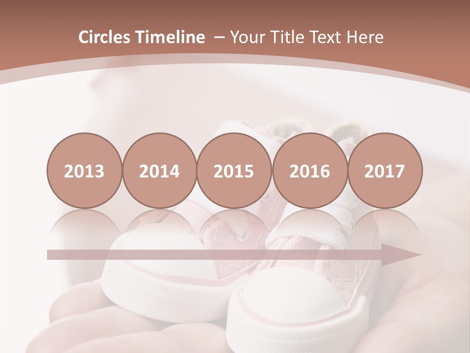 Pregnant Woman Holding Pair Of Pink Shoes For Baby Girl PowerPoint Template