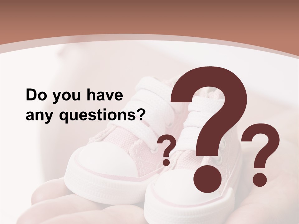 Pregnant Woman Holding Pair Of Pink Shoes For Baby Girl PowerPoint Template