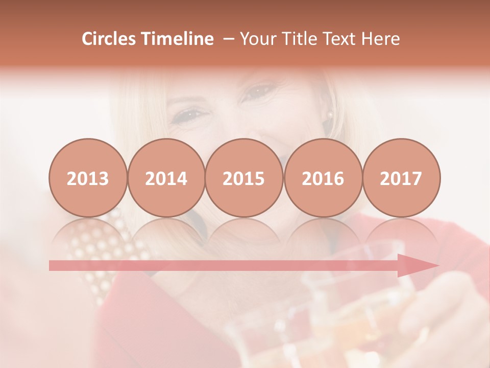 A Woman Is Smiling And Holding A Glass PowerPoint Template