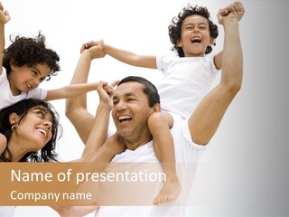 Family Lifestyle Portrait Of A Mum And Dad With Their Two Kids Having Fun PowerPoint Template