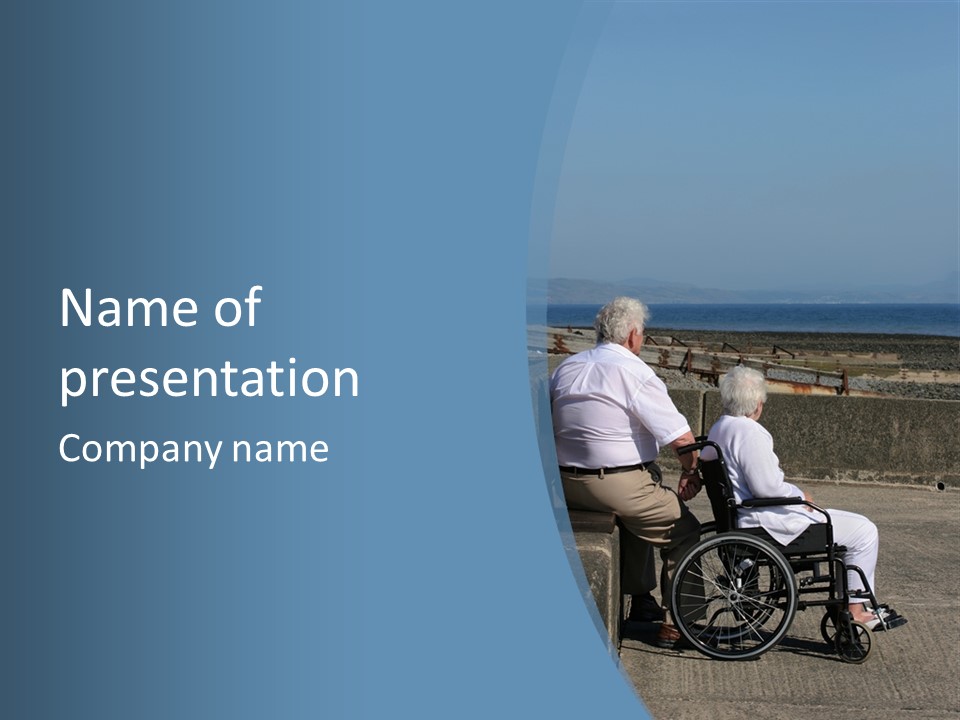 A Man In A Wheel Chair With A Woman Sitting Next To Him PowerPoint Template