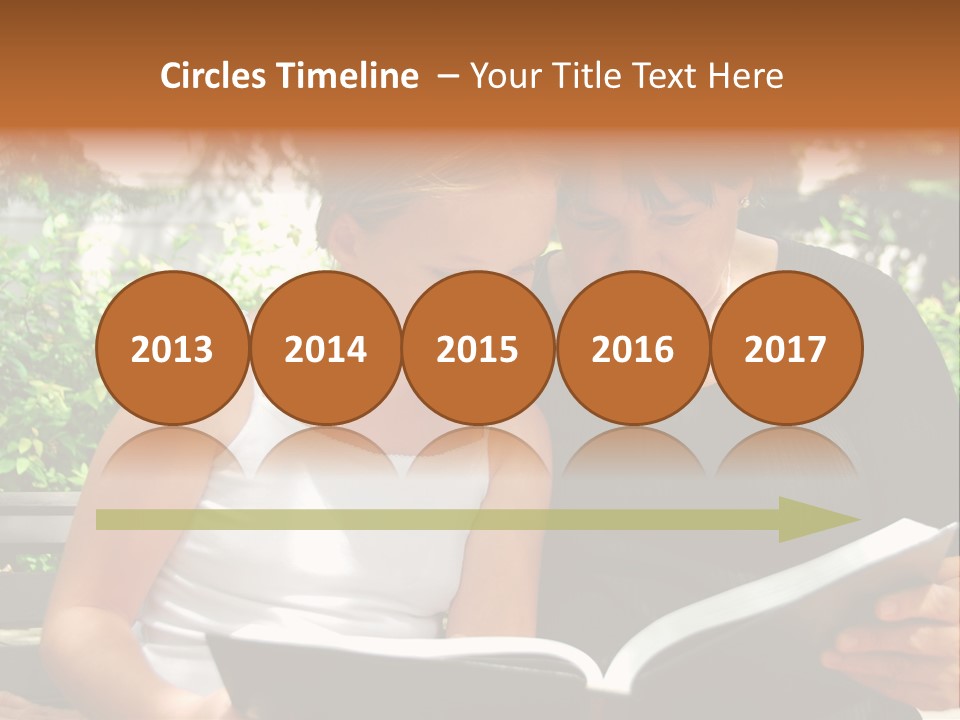 Grandmother And Granddaughter Reading A Book PowerPoint Template