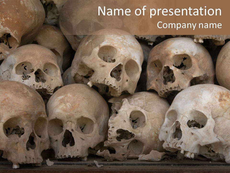 Skulls From A Mass Grave Of Khmer Rouge Victims In Choeung Ek Aka The Killing Fields Near Phnom Penh, Cambodia. PowerPoint Template