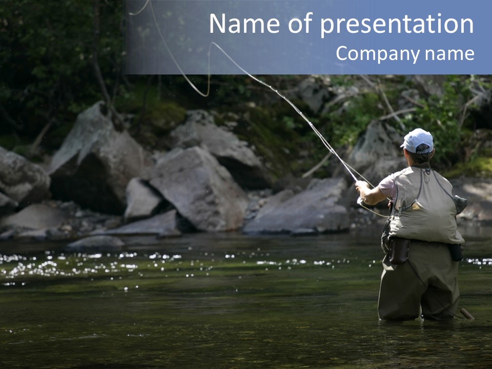 A Man Standing In A River Holding A Fishing Rod PowerPoint Template