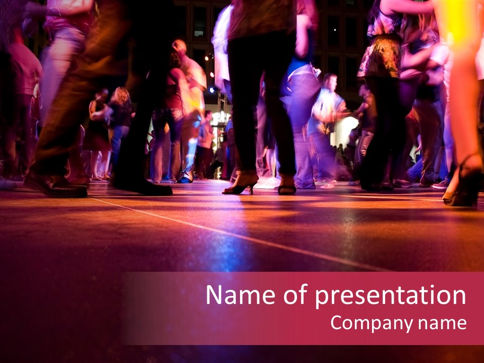 A Group Of People Dancing On A Dance Floor PowerPoint Template