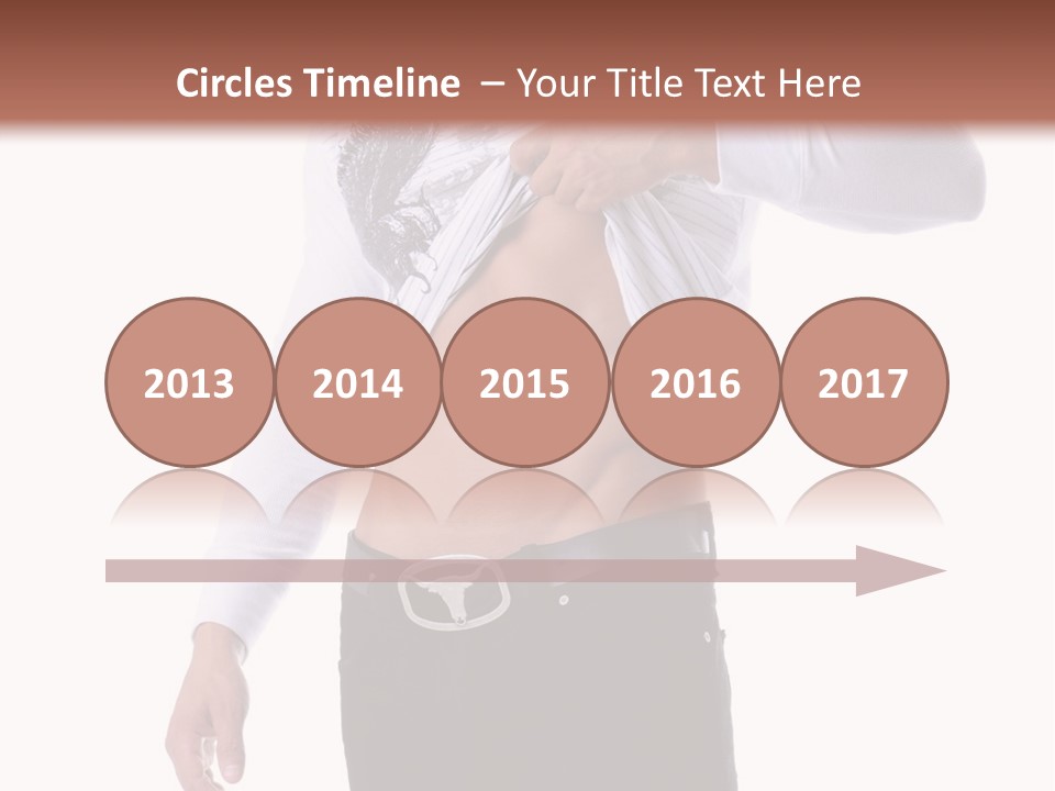 Muscular Young Man Standing In Black Jeans And Removing A White Long Sleeve T-Shirt PowerPoint Template