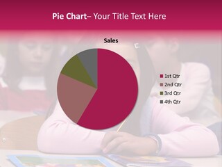 A Group Of Children Sitting At A Table In A Classroom PowerPoint Template