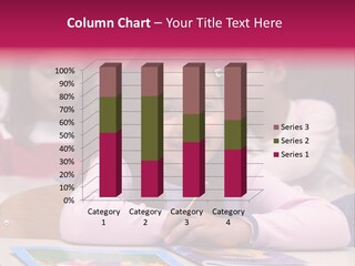 A Group Of Children Sitting At A Table In A Classroom PowerPoint Template