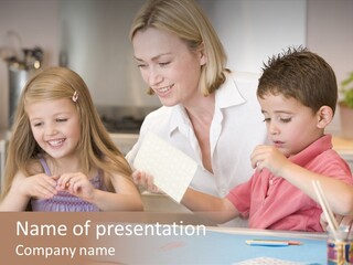 Woman And Two Young Children In Kitchen With Art Project Smiling PowerPoint Template