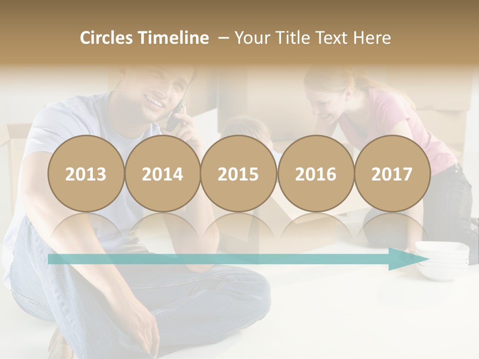 A Man Sitting On The Floor Talking On A Cell Phone PowerPoint Template