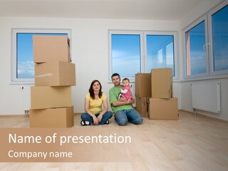 Family With Moving Boxes In New Home. PowerPoint Template