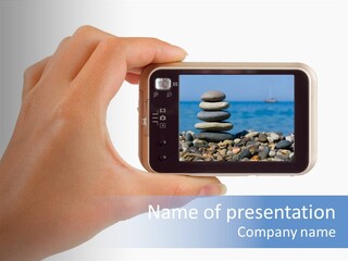 Photo Camera In Hand Isolated On White Background PowerPoint Template