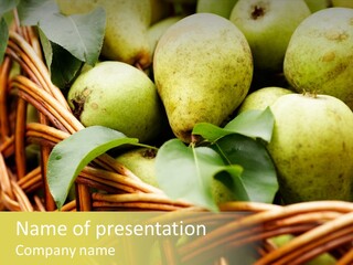 A Basket Filled With Green Apples Sitting On Top Of A Table PowerPoint Template