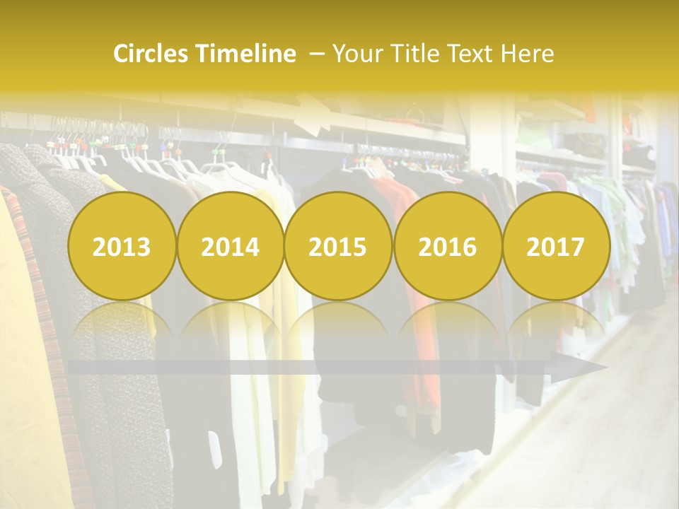 A Bunch Of Clothes Hanging On A Rack In A Store PowerPoint Template