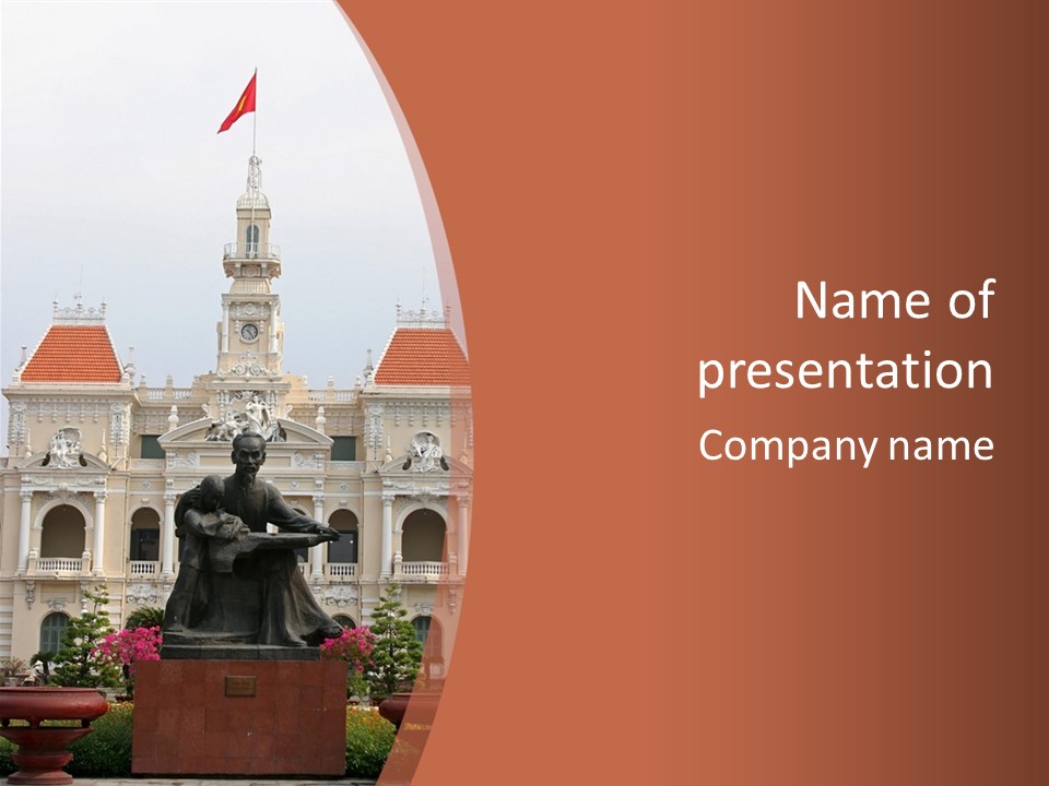 People's Committee Building In Ho Chi Minh City, Vietnam With Ho Chi Minh Statue In Front PowerPoint Template