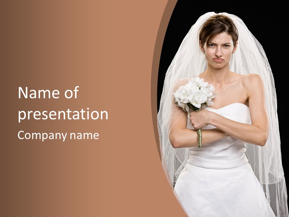 Studio Shot Of Frowning Young Bride In Wedding Dress And Veil PowerPoint Template