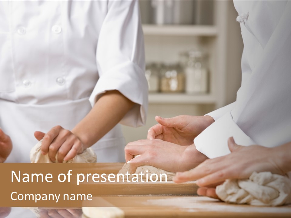 Chef Co-Workers In Toques And Chef?S Whites Kneading Dough In Commercial Kitchen PowerPoint Template