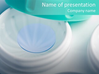 Blue Contact Lens In White Container PowerPoint Template