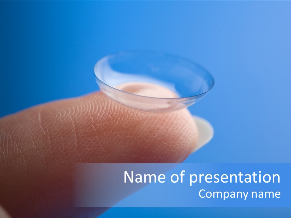 Finger Holding Contact Lens Over Blue Background PowerPoint Template