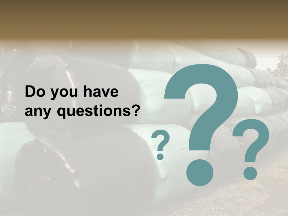 Circular Bales Of Hay Wrapped In Blue And Black Colored Plastic PowerPoint Template