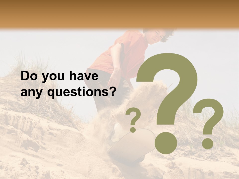 Teenager Sand Boarding Down A Sand Dune PowerPoint Template