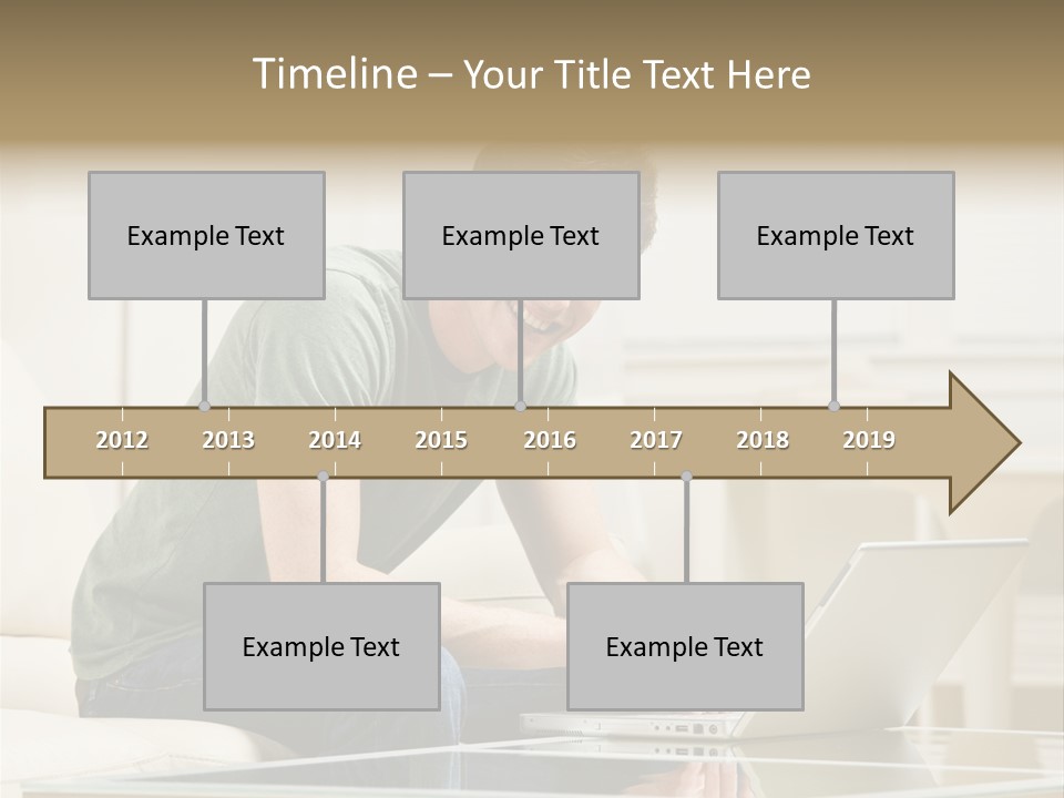 Man Sitting On Sofa In Livingroom Typing On Laptop PowerPoint Template