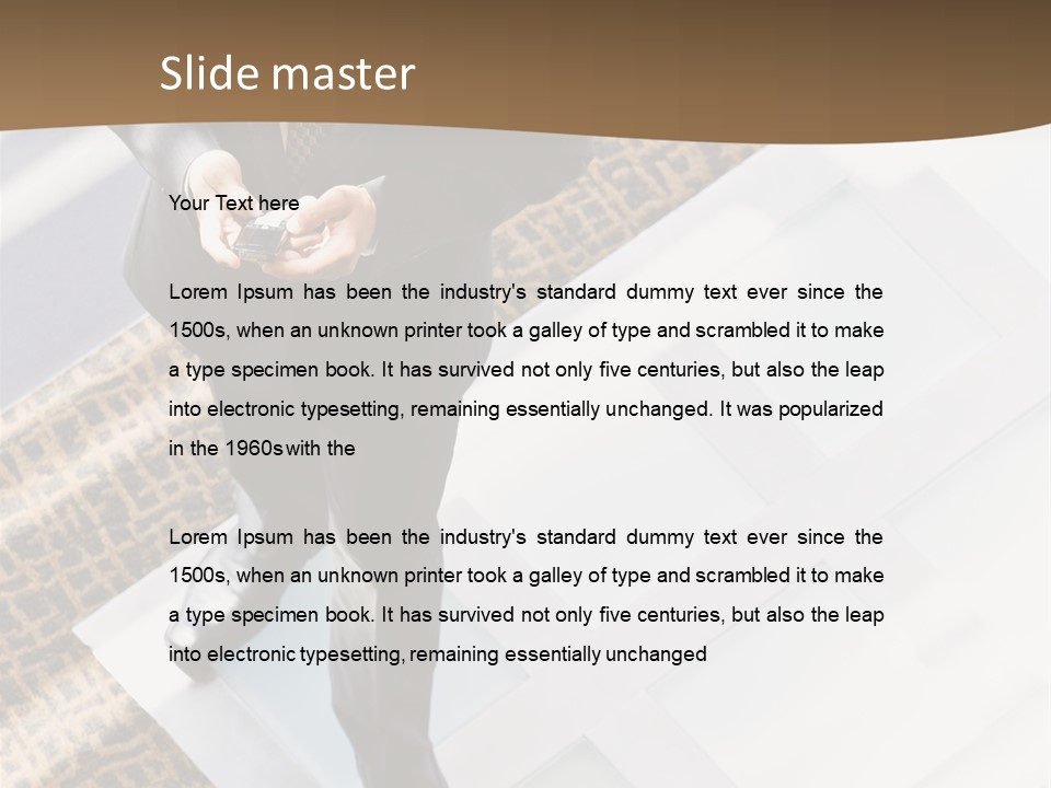 A Man In A Suit Is Looking Down At His Cell Phone PowerPoint Template