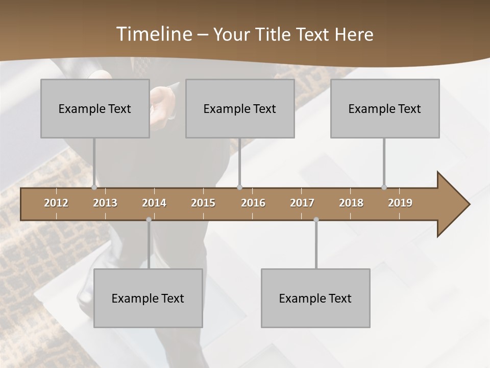 A Man In A Suit Is Looking Down At His Cell Phone PowerPoint Template