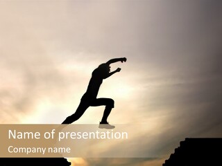 Silhouette Of Jumping Man Against Sunset PowerPoint Template