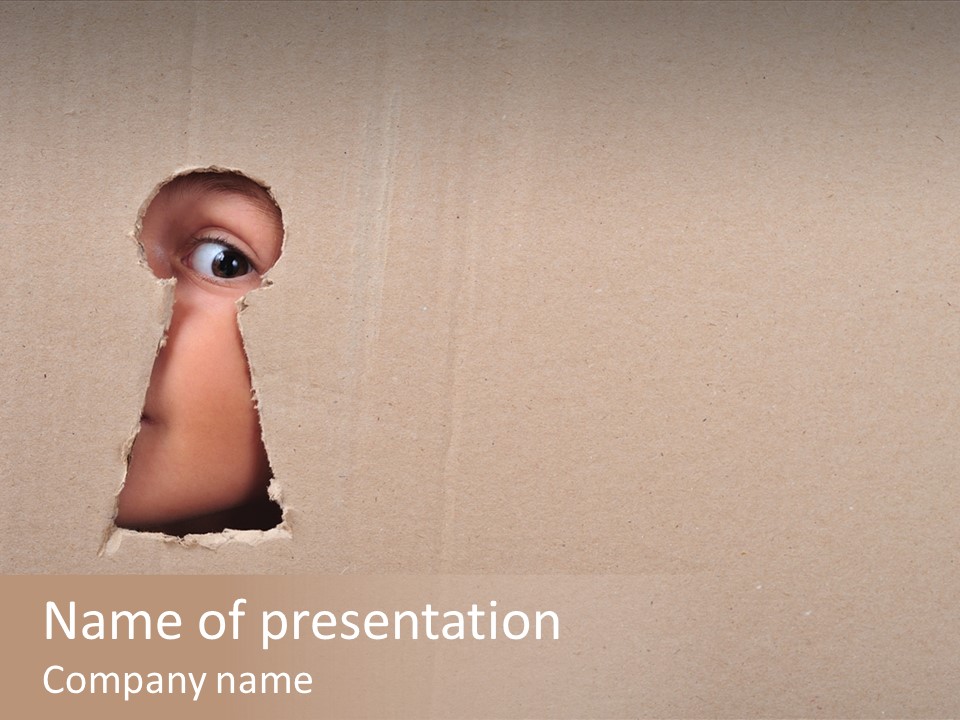 Eye Looking Through A Conceptual Keyhole On Cardboard, Close Up PowerPoint Template