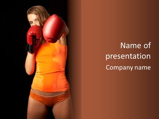 Sporty Girl In Boxing Gloves Punching PowerPoint Template