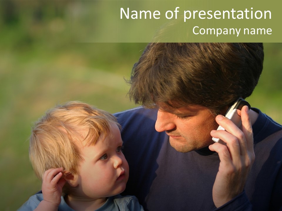 A Young Son Mimics His Father Who Is Talking On His Mobile PowerPoint Template