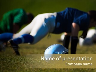 A Football Player Diving For A Ball On The Field PowerPoint Template