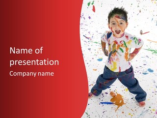 Adorable 3 Year Old Boy Child Covered In Bright Paint. Mess Of Paint On Wall, Floor, And Child. PowerPoint Template