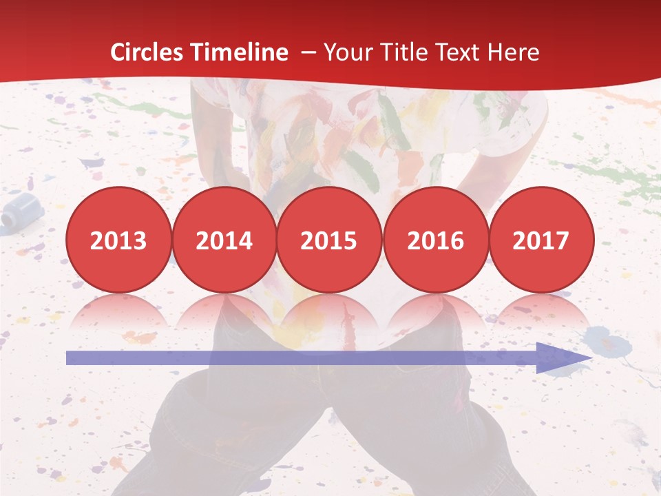 Adorable 3 Year Old Boy Child Covered In Bright Paint. Mess Of Paint On Wall, Floor, And Child. PowerPoint Template