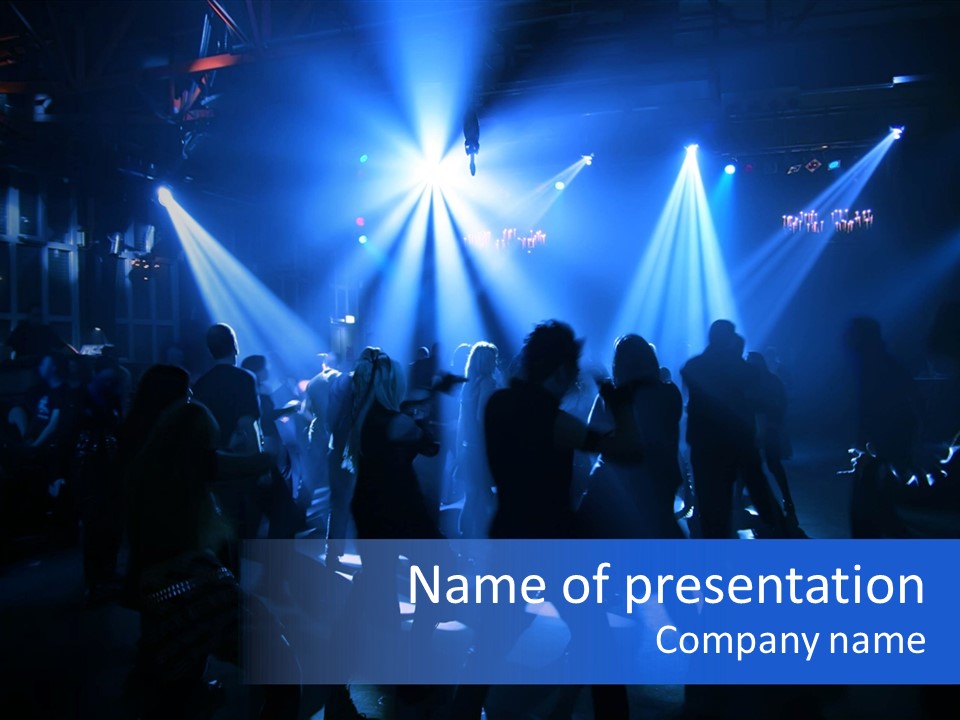 A Group Of People Standing In Front Of A Stage PowerPoint Template