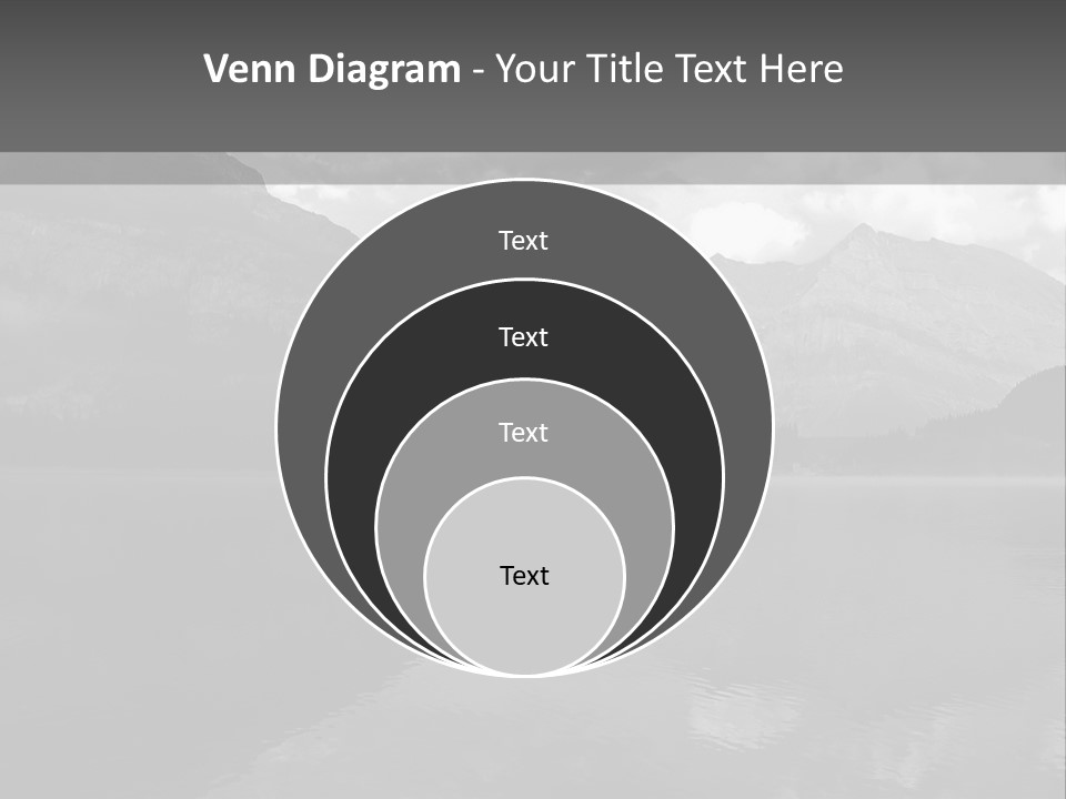 A Black And White Photo Of A Lake With Mountains In The Background PowerPoint Template